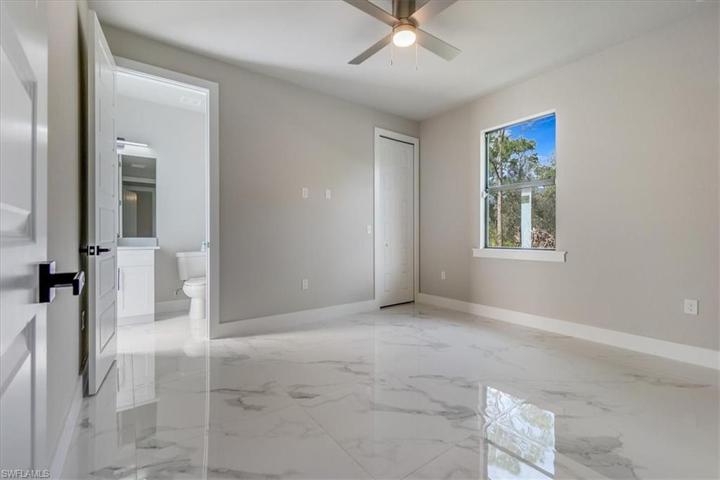 Guest bedroom or perfect nursey/children's room with private bathroom.