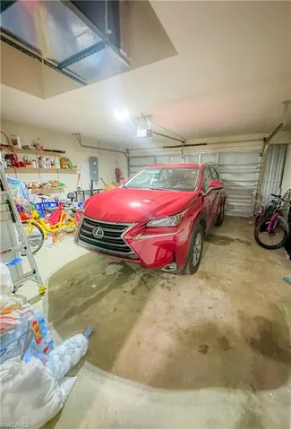Garage featuring electric panel