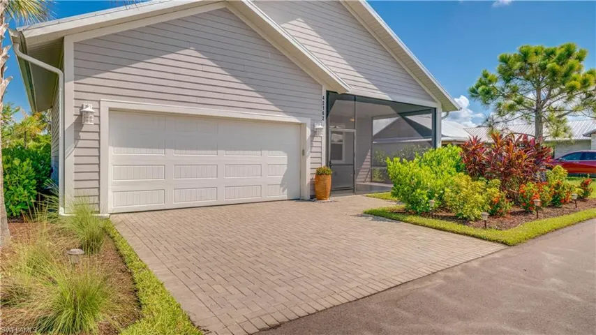 Beautiful paver driveway & walkway off alley.