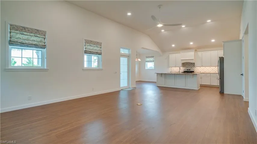 Open concept Great Room & Kitchen with high cathedral ceiling!