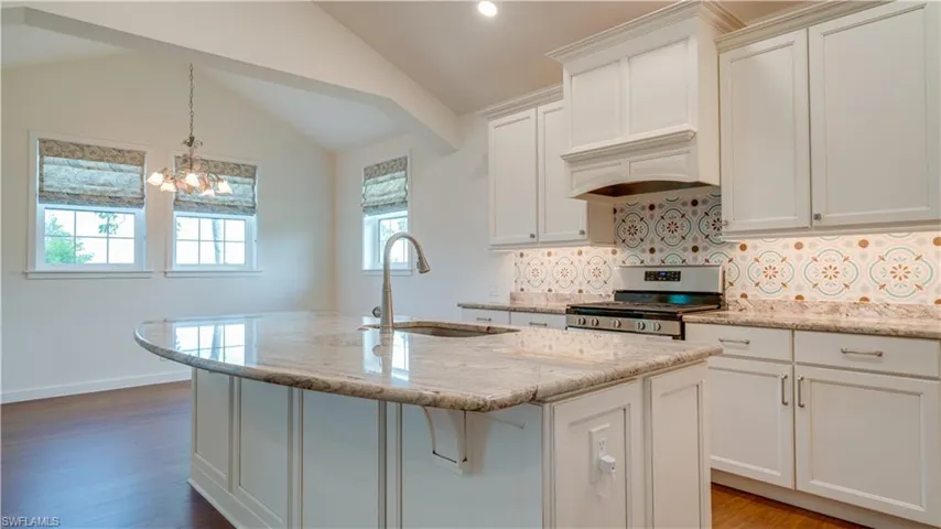Kitchen alcove features the dining area.