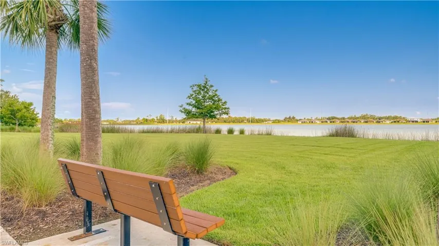 A peaceful parkbench by the lake just outside your front door.