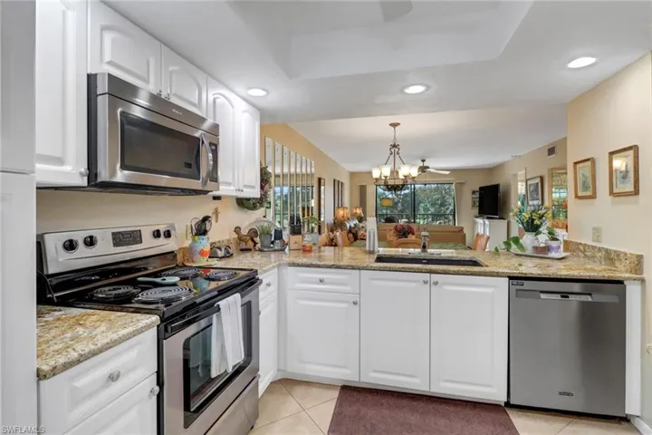 Updated cabinets, granite & stainless appliances