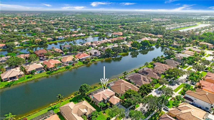 Aerial view of residential area with a nearby body of water