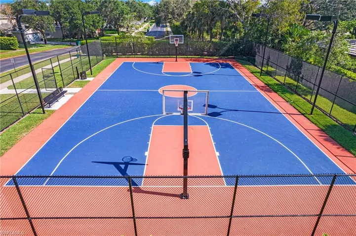 View of basketball court featuring community basketball court