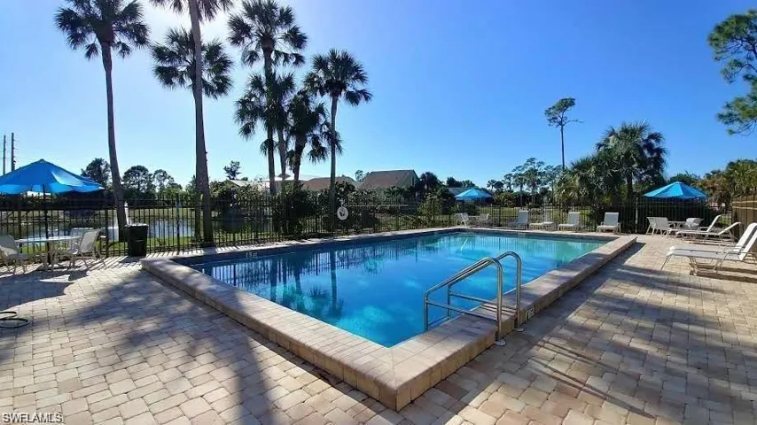 View of swimming pool with a patio area