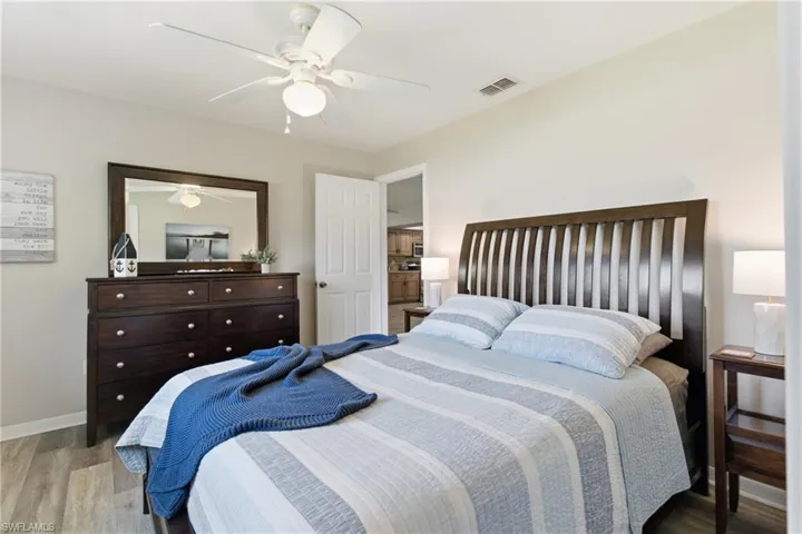 Bedroom featuring light wood-style flooring and a ceiling fan