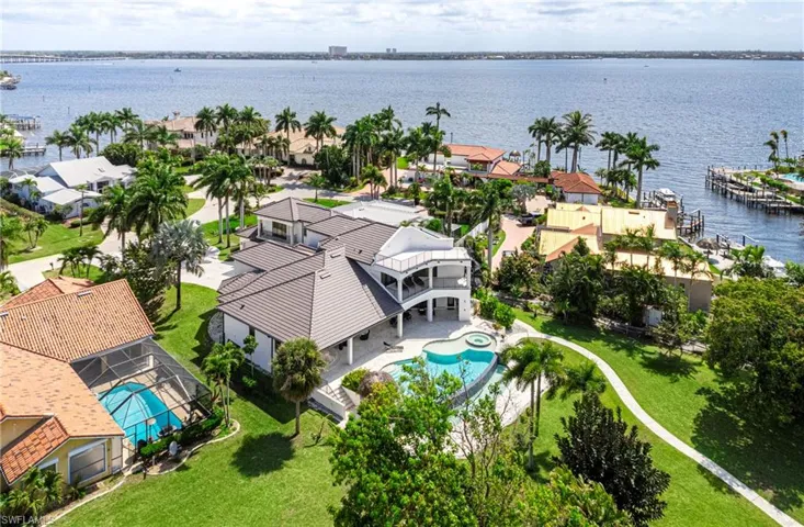 Aerial view of residential area with a nearby body of water