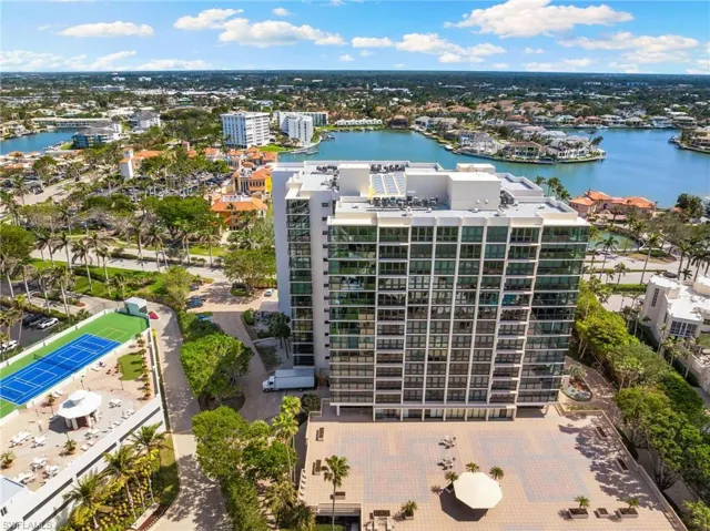 Bird's eye view of a nearby body of water and apartment complex