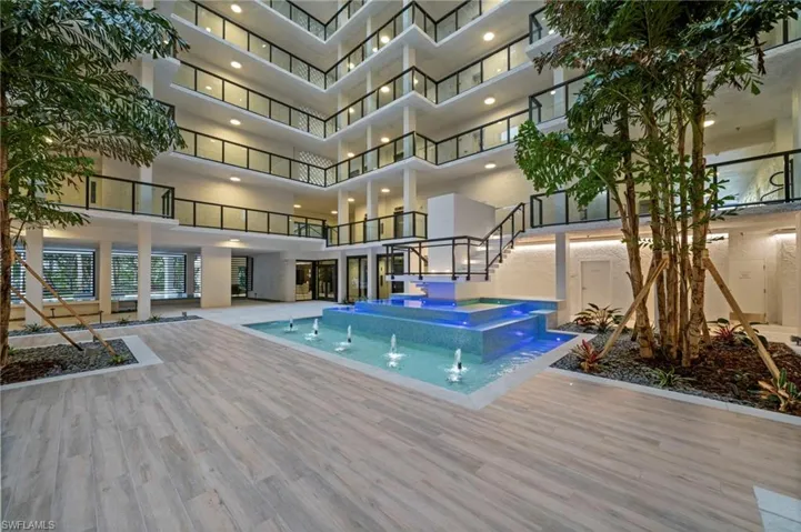 View of pool featuring a pool with connected hot tub