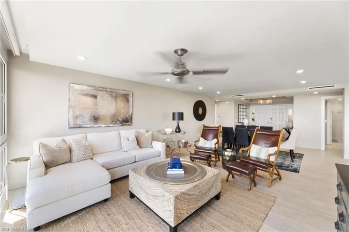 Living area featuring ceiling fan, recessed lighting, and light wood finished floors