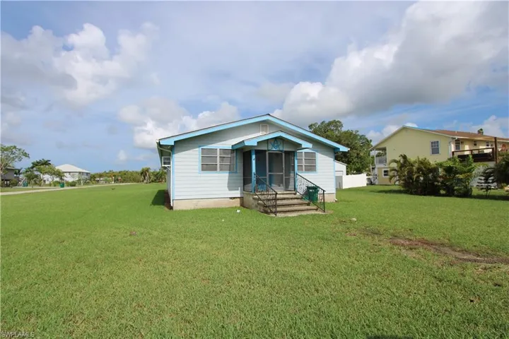 of property featuring a lawn