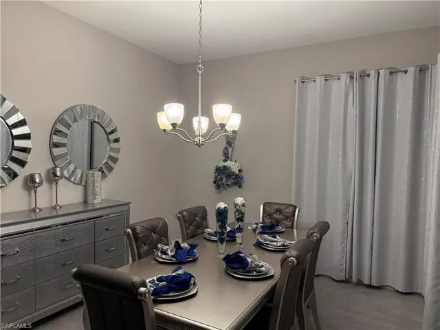 Dining room with a chandelier