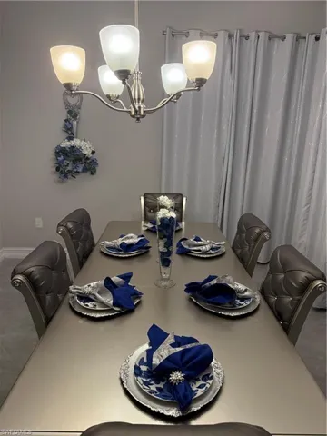 Dining area featuring a chandelier