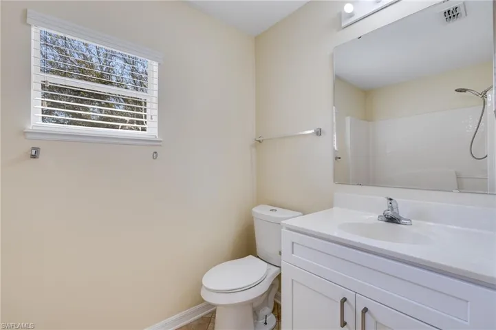 Full bathroom with a shower and vanity