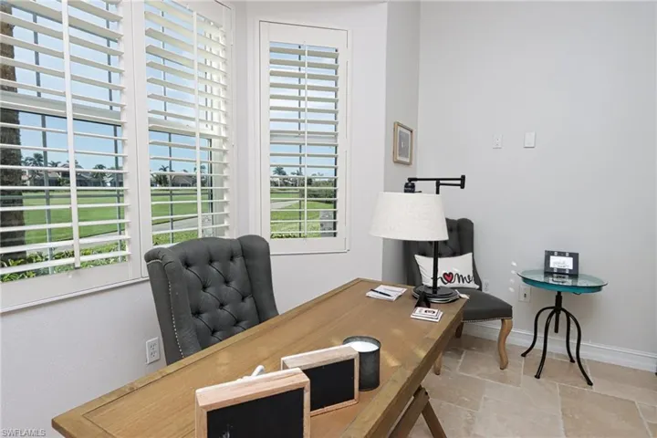 Home office with tile patterned floors