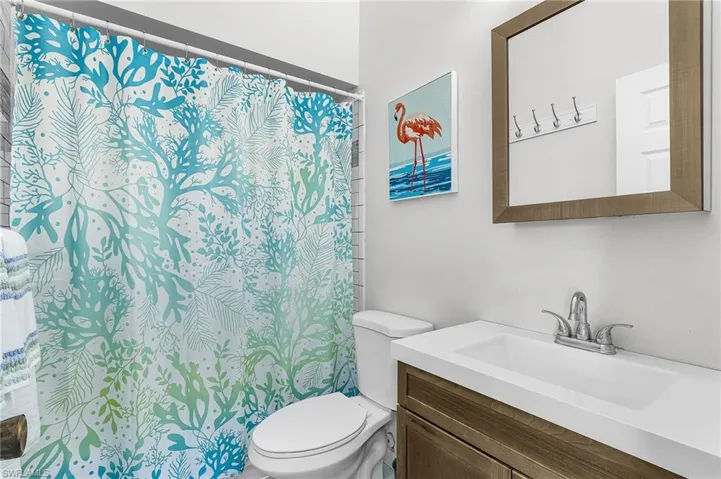Main bathroom upstairs with a tub/shower combo.