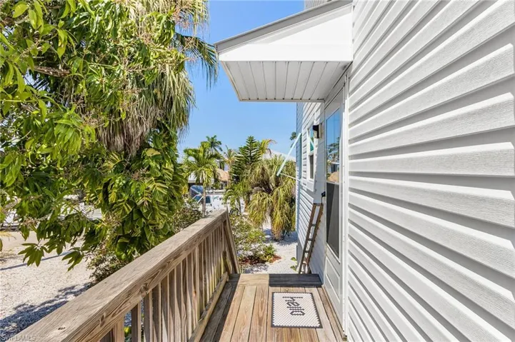 Deck around the side of the home.