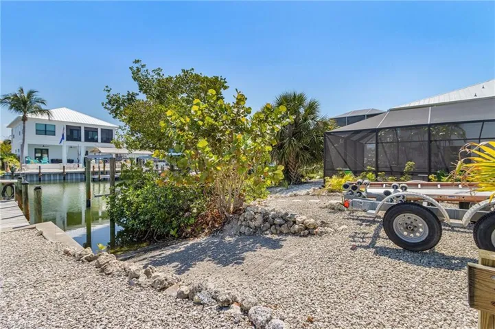 Private boat ramp, and no restrictions for parking boat trailers, RVs, etc.  Maintenance-free yard.