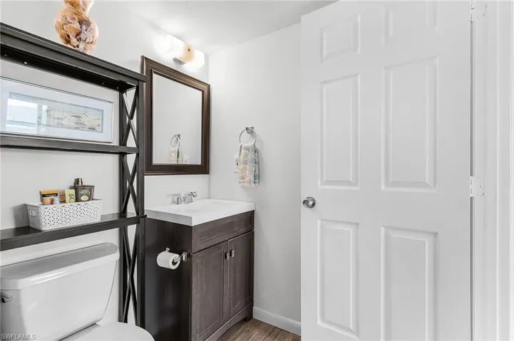 Guest half bath on the main living level.