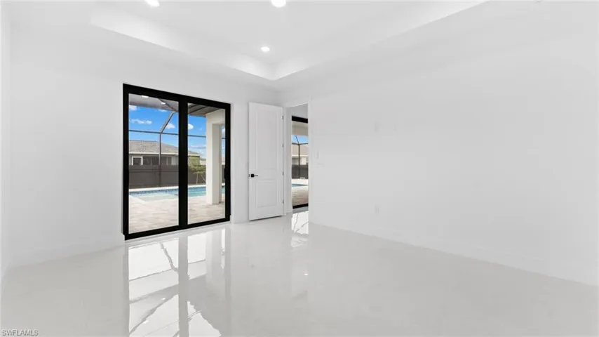 Empty room with a raised ceiling