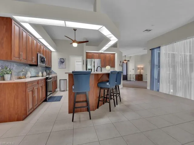 Kitchen w/ Long Breakfast Bar