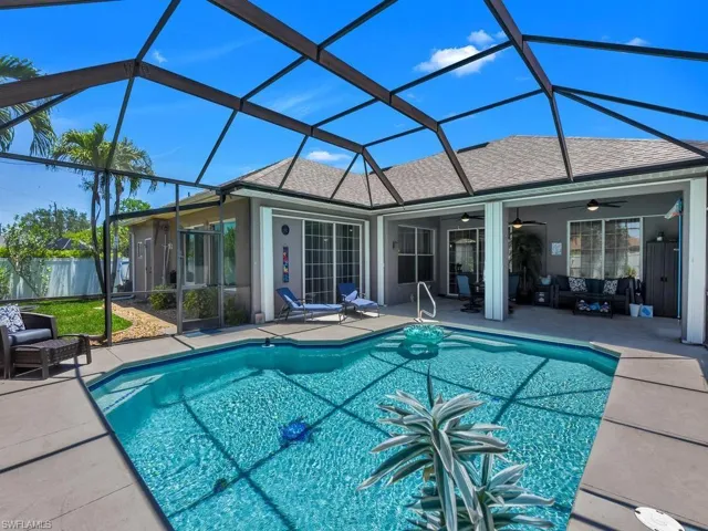 Amazing SWFL Living - Accordian (sliding) Hurricane Shutters on Lanai