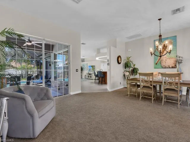 Living & Family Room Layout - New Impact Windows & Front Door in 2025. PLus Accordian Shutters on Lanai