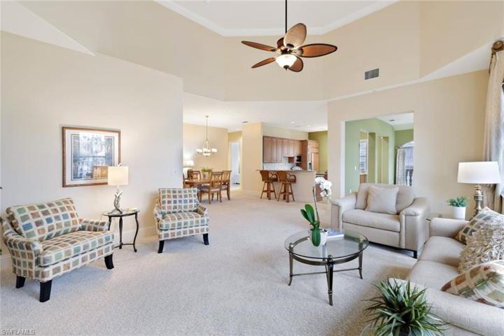 Has volume ceilings opens to dining, kitchen and bonus room