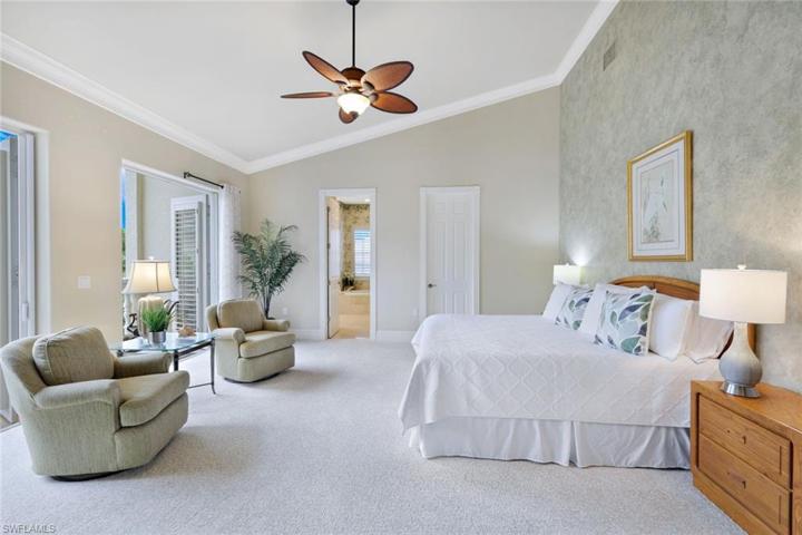 Main bedroom has vaulted ceilings, two sets of 8' French doors with Plantation shutters. These open to an open balcony. Each door is equiped with a "Phantom" screen.