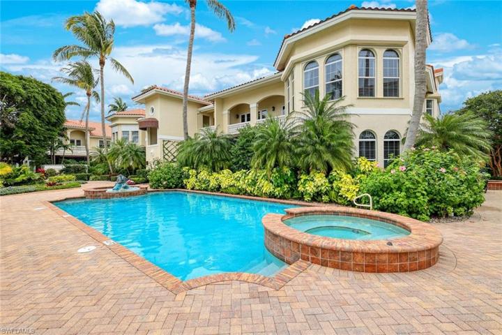 Large pool area with two hot tubs