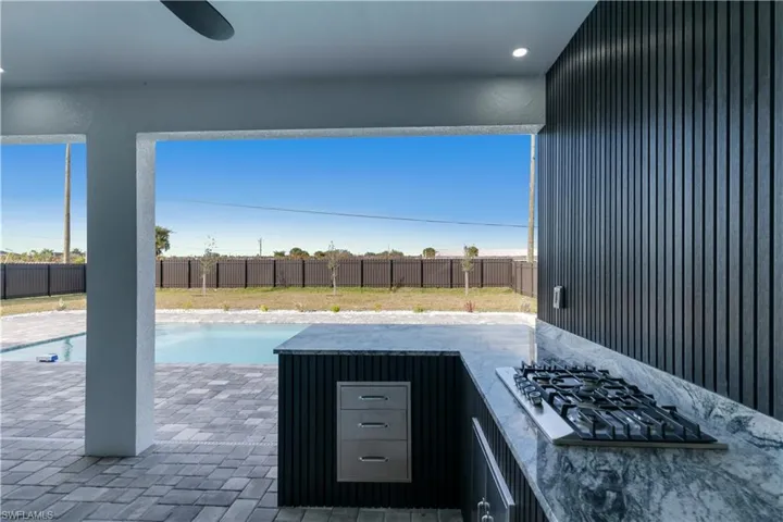 View of patio / terrace featuring a fenced in pool
