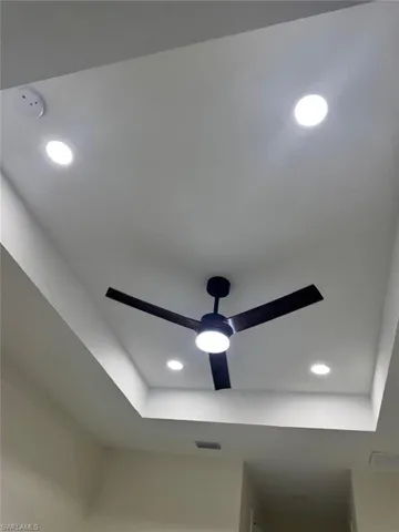Room details featuring visible vents, a ceiling fan, and recessed lighting