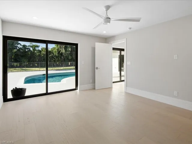 Master Bedroom room featuring recessed lighting, baseboards, wood finished floors, and ceiling fan