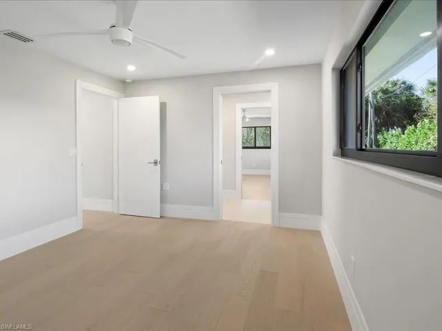 Unfurnished bedroom featuring recessed lighting, baseboards, visible vents, and light wood-type flooring