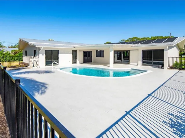 View of swimming pool with a fenced in pool, a patio, and fence