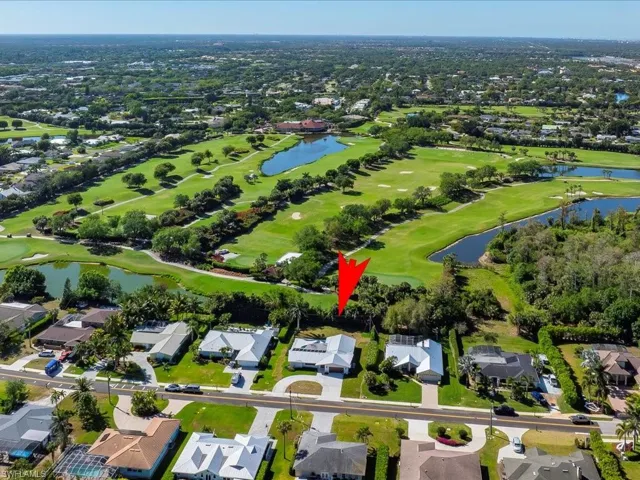 Bird's eye view with a residential view, a water view, and view of golf course