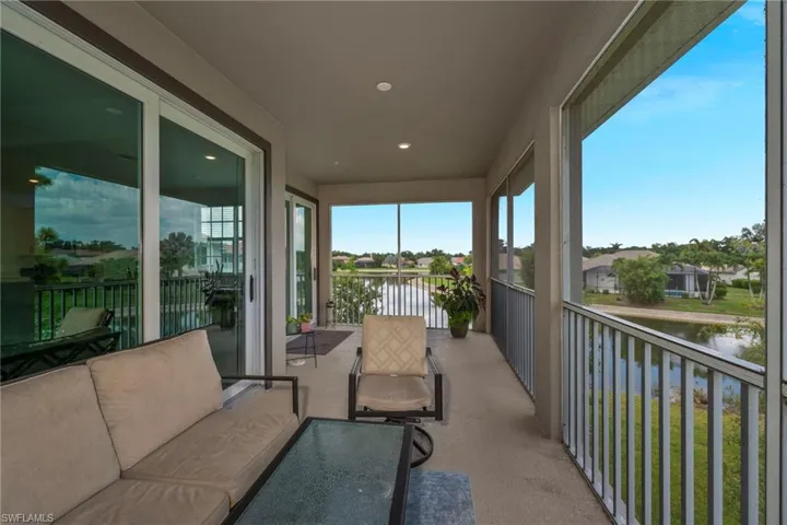 Master Balcony entrance featuring a water view