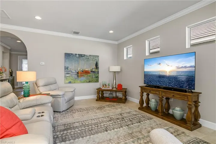Tiled living room with ornamental molding