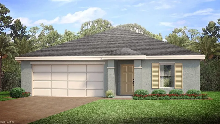 View of front of house with a front yard and a garage