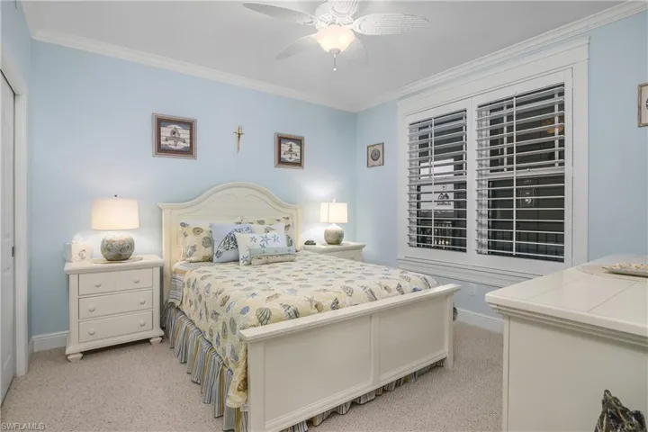 Crown molding, framed shutters & blackout shade