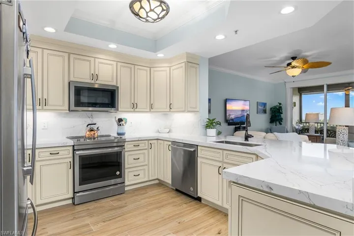 Totally redone kitchen with newer appliances, cabinets, flooring and countertops