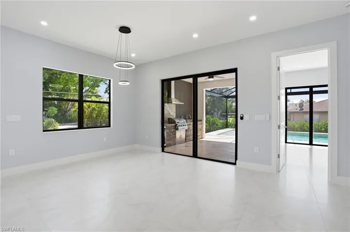 view of outdoor kitchen and pool
