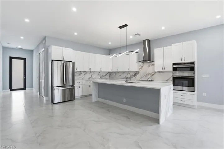 Quartz Countertops, Stainless Appliances