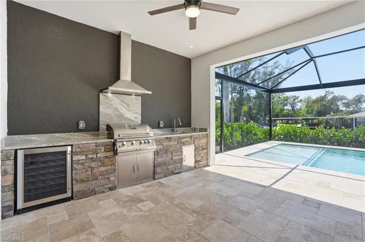 Outdoor kitchen and heated pool