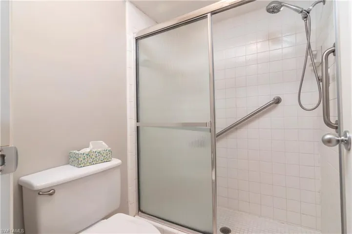 Bathroom with walk in shower and toilet
