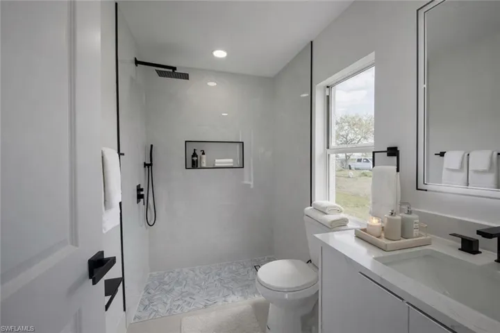 4529_Full bath with vanity, walk in shower, and recessed lighting