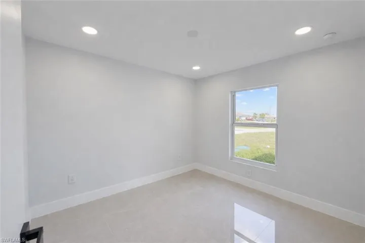 4529_Spare room with recessed lighting and light tile patterned flooring