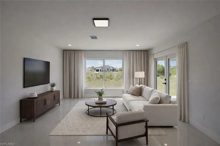 Living room featuring recessed lighting and french doors