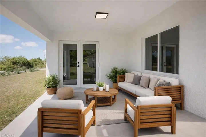 4529_View of patio / terrace featuring french doors and an outdoor lounge area